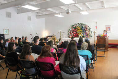 rows of churchgoers at jubilee episcopal church in austin, texas, an LGBTQ+-friendly church