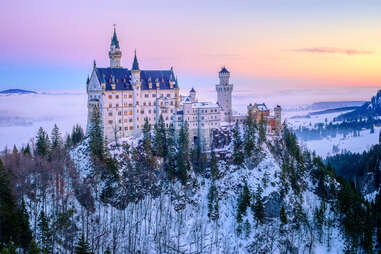 Beautiful Neuschwanstein castle, the main touristic landmark in Bavaria, in a winter day morning light.