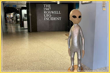 an alien statue inside the UFO museum in Roswell, New Mexico